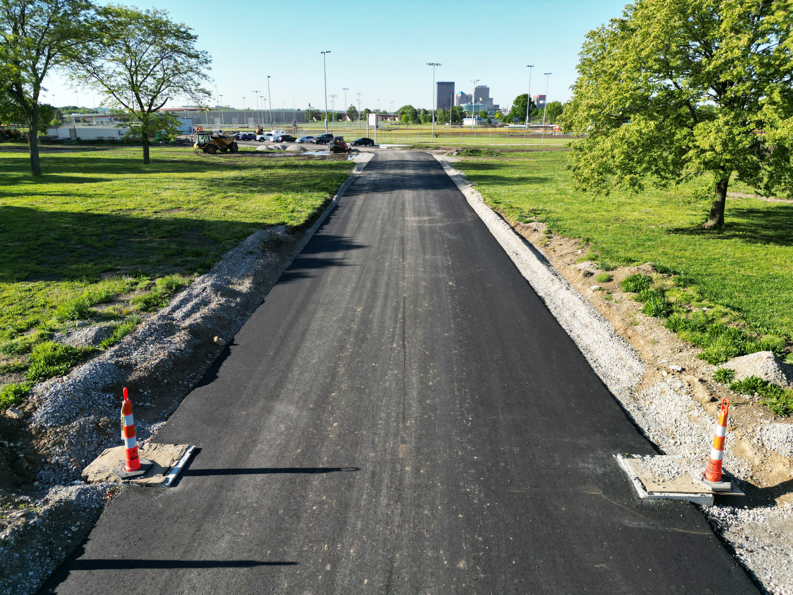 Road that leads to a parking lot