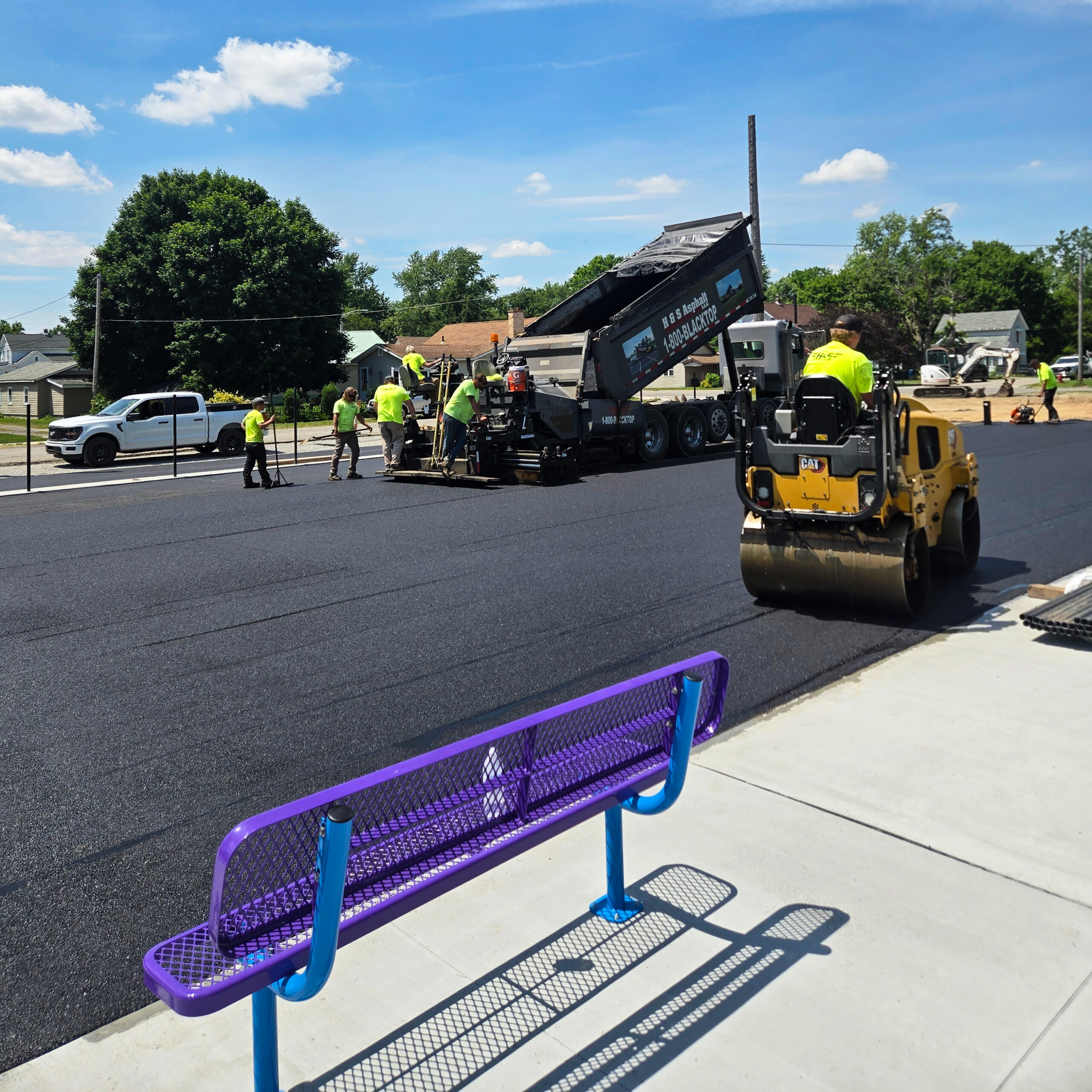 H&S Asphalt Crew Paving a Basketball Court