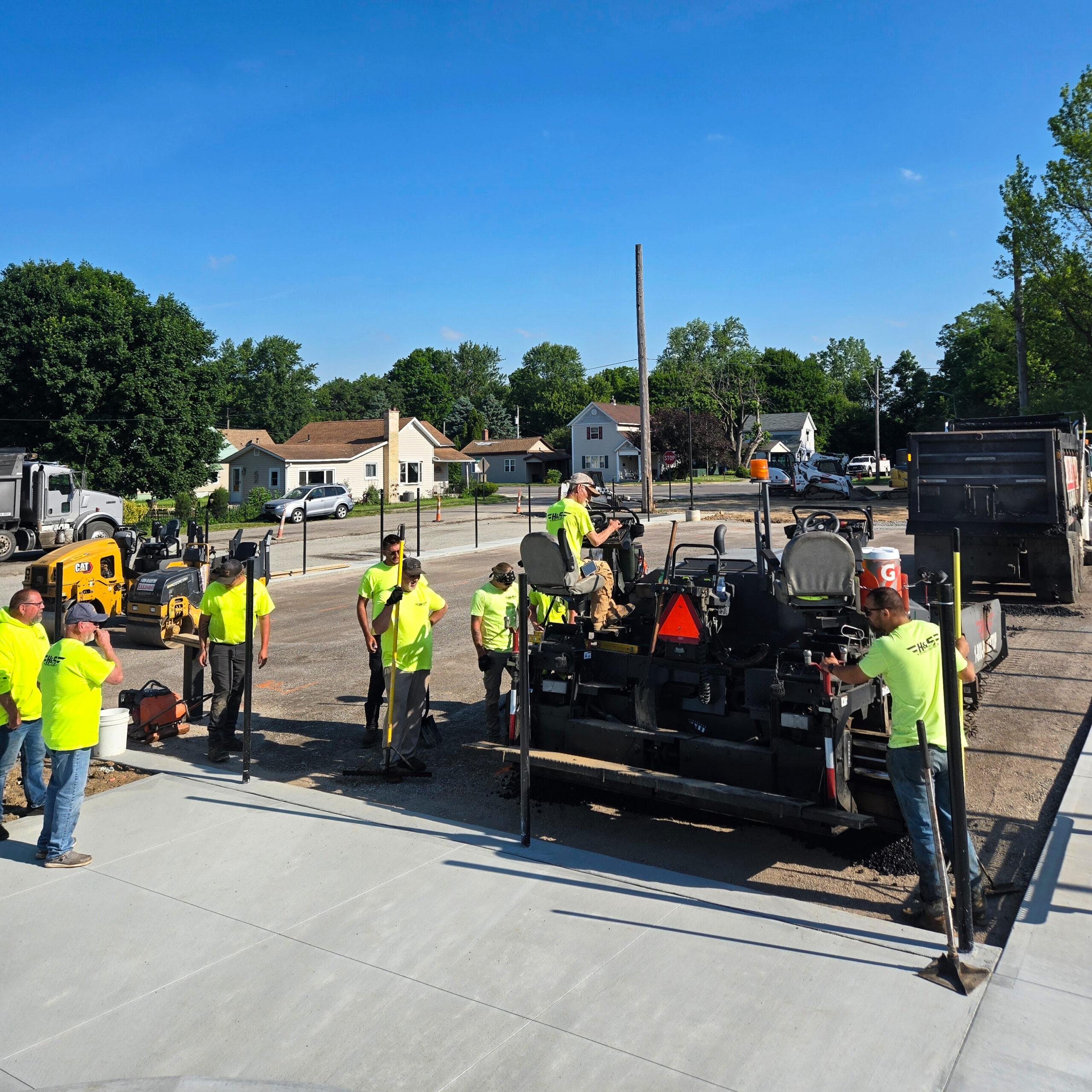 H&S Asphalt Crew Paving a Basketball Court