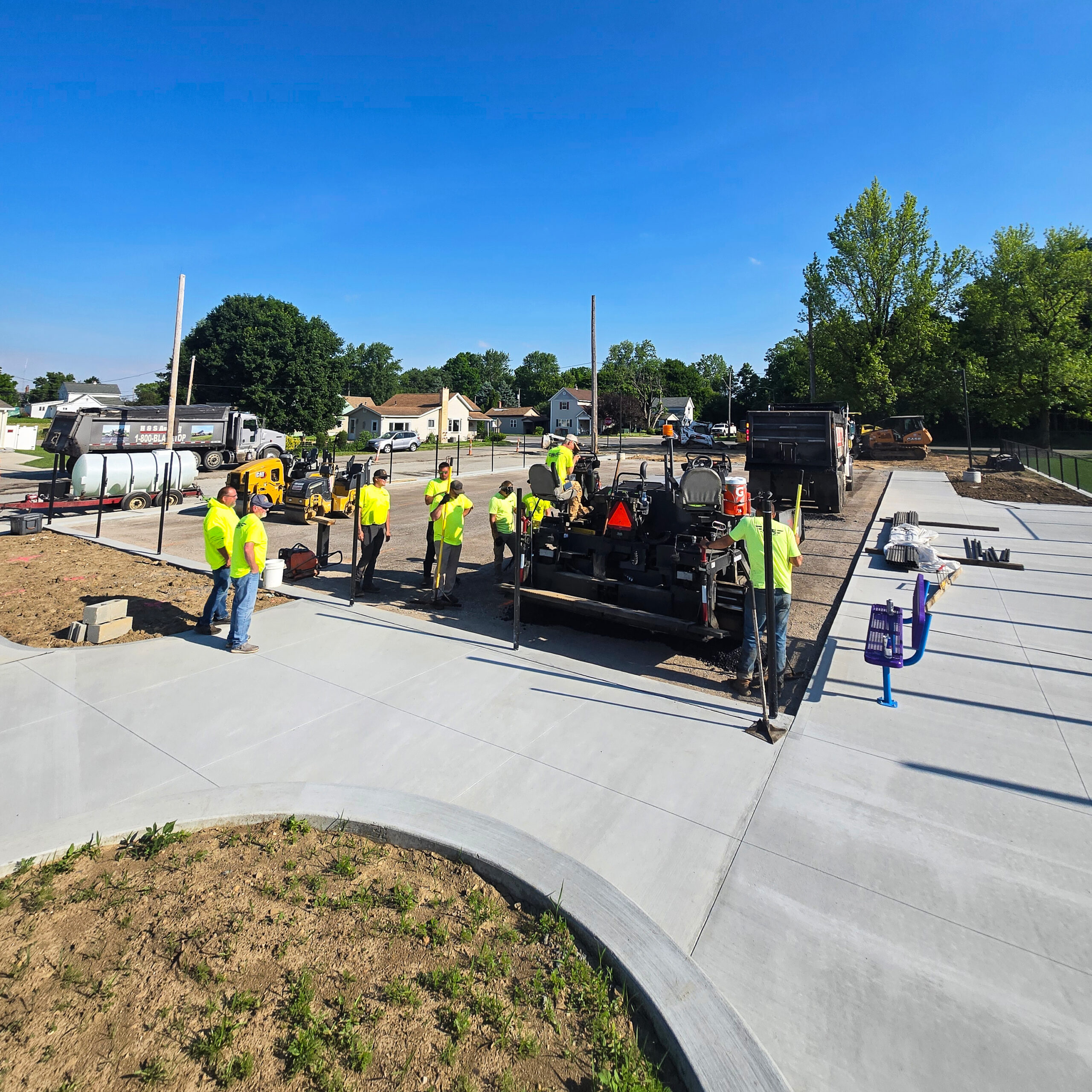 H&S Asphalt Crew Paving a Basketball Court